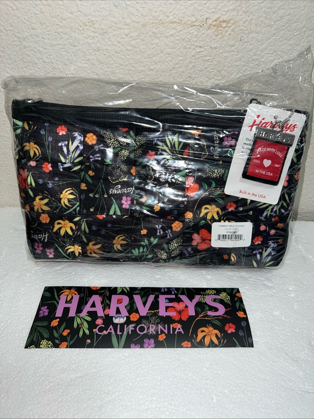 Harveys seatbelt harveys Wildflower Convertible Clutch with sticker